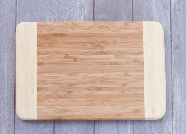 Placa de corte de madeira vazia — Fotografia de Stock
