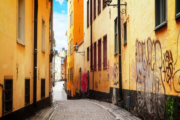 View of old town narrow street in Stockholm old town, Sweden, toned