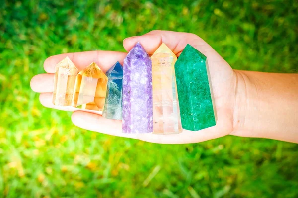 Healing crystals on brown background