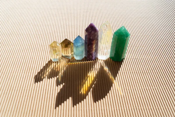 Healing crystals on brown background