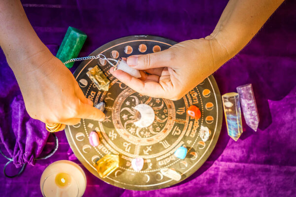 Top view of astrologer hands