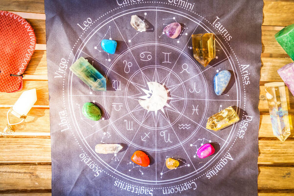 Healing crystals on brown background