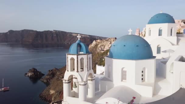 Establishing Shot Oia White Church Belfry Blue Domes Volcano Caldera — Video