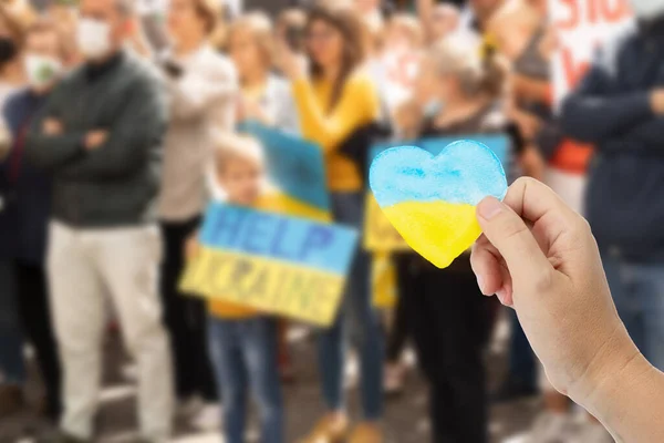 Hand Holding Heart Colors Ukranian Flag Rally War Support Ukraine — Stock fotografie