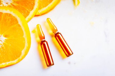 C vitamini, doğal anti-aging kozmetik kavramı, düz yatıyordu