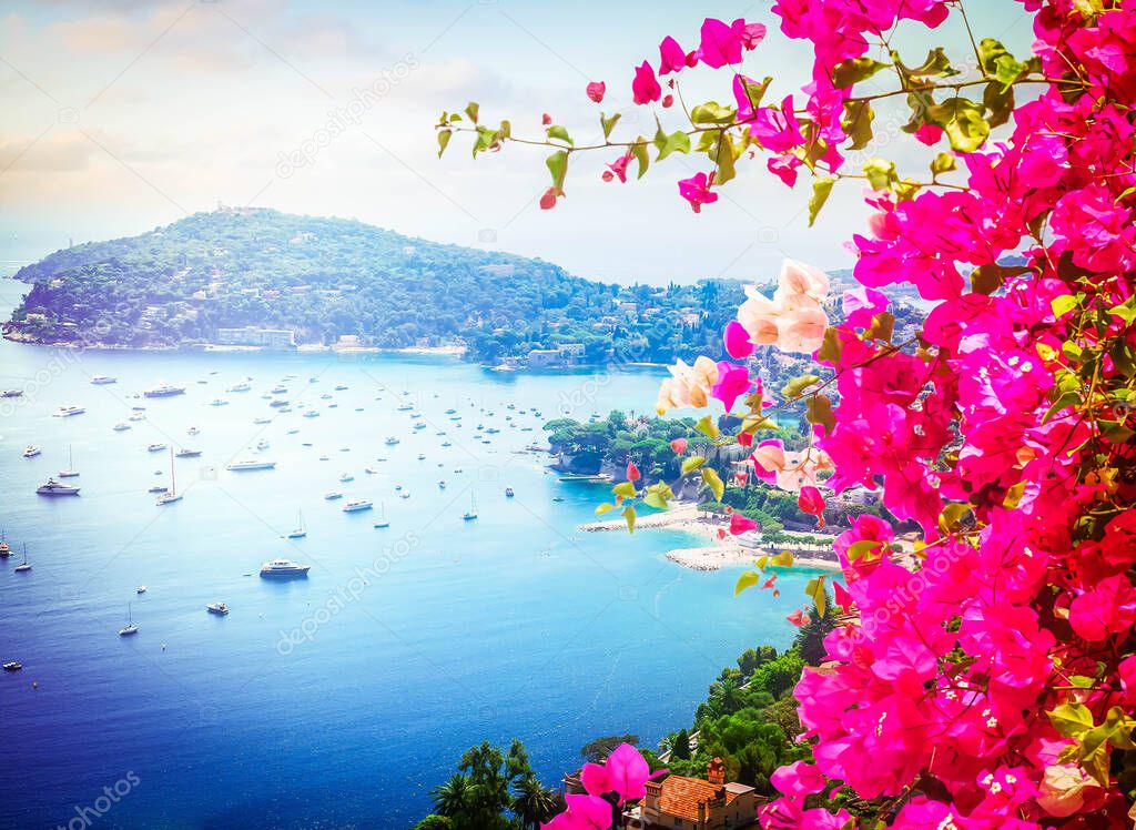 lanscape of coast and turquiose water of cote dAzur with flowers, French Riviera, France