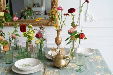 home interior decorations, view of dinner table with fall flowers