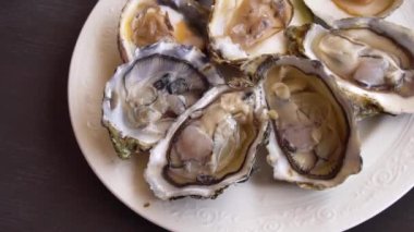 view of the raw oysters with shells on desk