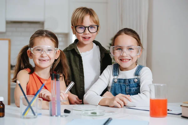 Portrait Three Happy Little Kids Doing Home Science Project All — 图库照片