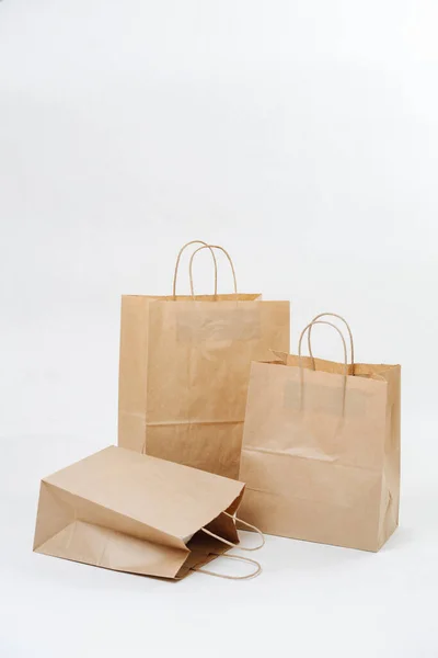 Composition Three Empty Brown Paper Bags White Background Eco Friendly — Stok fotoğraf