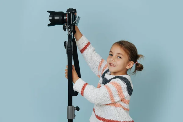 Funny Little Girl Striped Sweater Hair Buns Reaching Her Digital Stock Image