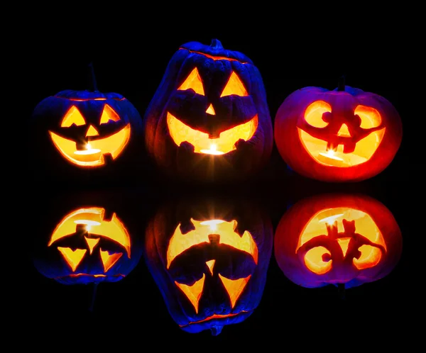 Halloween pumpkins glowing inside — Stock Photo, Image