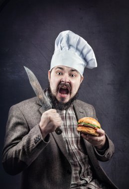 koken met hamburger en mes