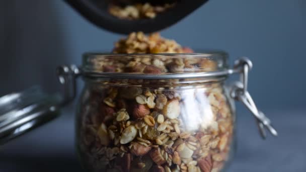 Homemade Granola in glass jar — Stock Video