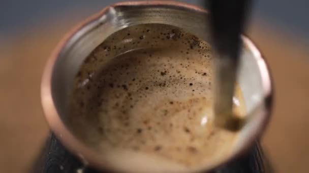 Making Turkish coffee in copper cezve — стоковое видео