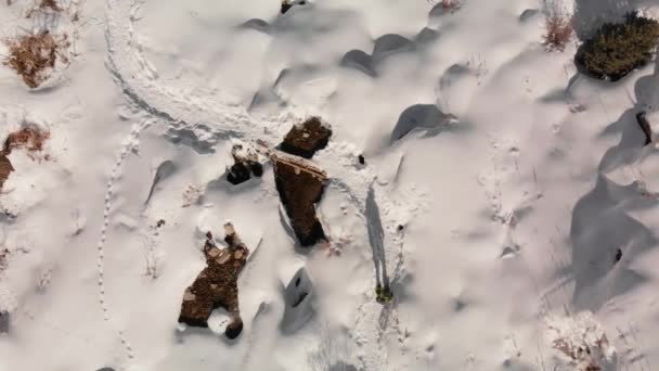 Hiker crossing river at beautiful winter mountains — Stock Video