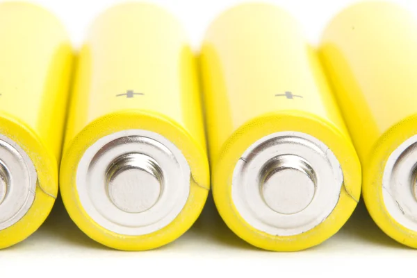 Yellow alkaline batteries isolated on white background — Stock Photo, Image