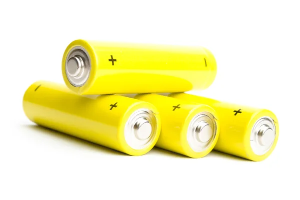 Yellow alkaline batteries isolated on white background Stock Photo