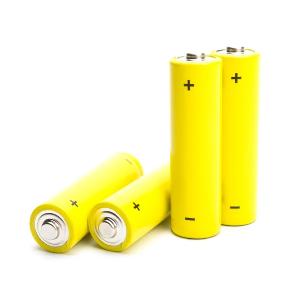 Yellow alkaline batteries isolated on white background Stock Photo