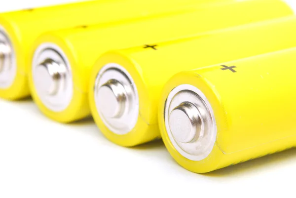 Yellow alkaline batteries isolated on white background — Stock Photo, Image