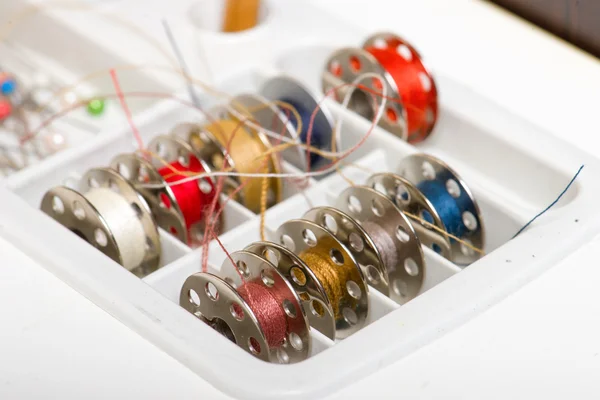 Bobbins in box — Stock Photo, Image