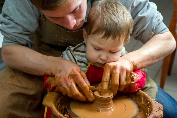 Boy potter at work in the studio — Stock Photo, Image