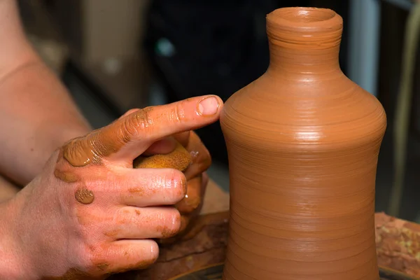 Hands of a potter, creating an earthen jar — Stock Photo, Image
