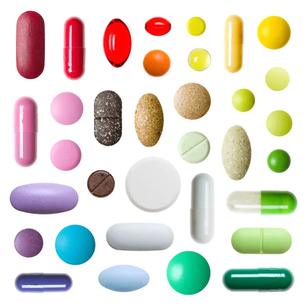 Красочные таблетки изолированы на белом фоне — стоковое фото