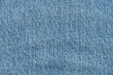 Kot pantolon arka planı kapatır. Denim dikişleri