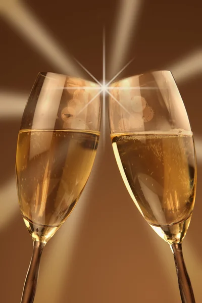 Christmas glasses of Champagne and golden background — Stock Photo, Image