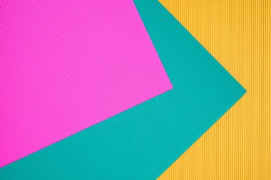 turquoise, pink and yellow three tone color paper background with stripes. Abstract background modern hipster futuristic. Texture design