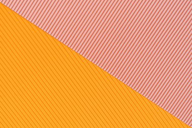 Orange and pink two tone color paper background with stripes. Abstract background modern hipster futuristic. Texture design
