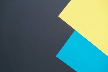 Mavi, siyah, sarı, üç tonlu şeritli kağıt. Soyut arka plan modern hipster fütüristik. Doku tasarımı