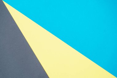 Mavi, siyah, sarı, üç tonlu şeritli kağıt. Soyut arka plan modern hipster fütüristik. Doku tasarımı