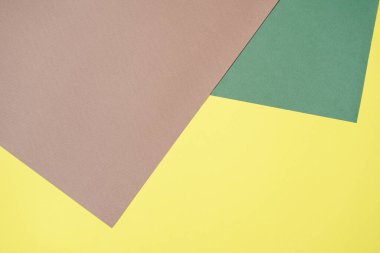 Kahverengi, sarı, yeşil, üç renkli, çizgili kağıt. Soyut arka plan modern hipster fütüristik. Doku tasarımı