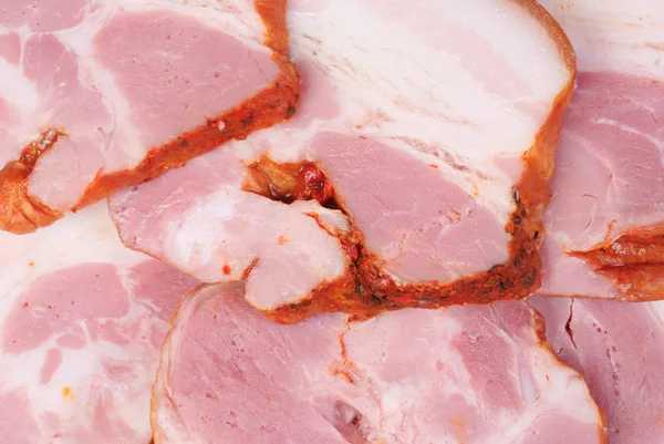Bacon skuret som mat bakgrund — Stockfoto