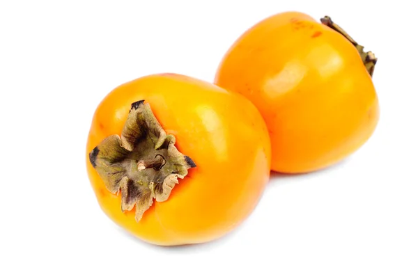 Persimmon Fruchtscheibe auf weißem Hintergrund — Stockfoto