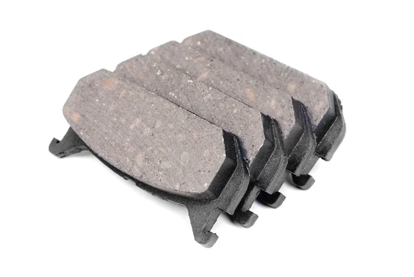 Four brake pads, isolatet on white — Stock Photo, Image