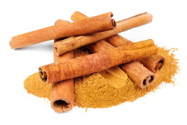 Cinnamon - sticks and powder isolated on white clipart