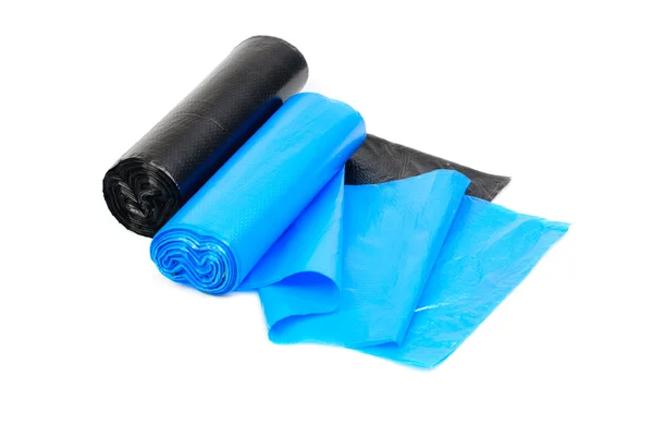 Roll of blue and black garbage bags on a white background — Stock Photo, Image