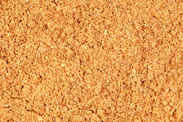 Cinnamon powder as nature food background — Stock Photo, Image