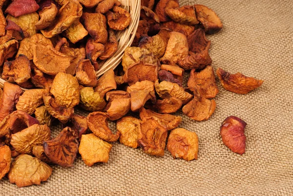 Dried fruit on burlap background — Stock Photo, Image