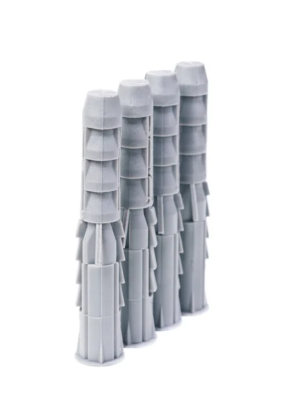 Kunststoff Straddling Dübel auf weißem Hintergrund — Stockfoto