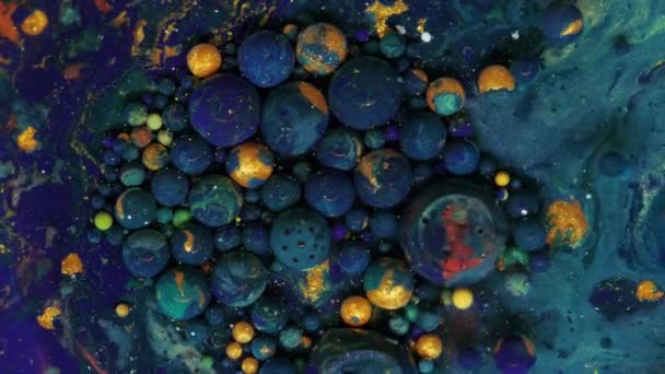 Pastel i bevegelse, bestående av lilla / blå baller som beveger seg kaotisk. – stockvideo