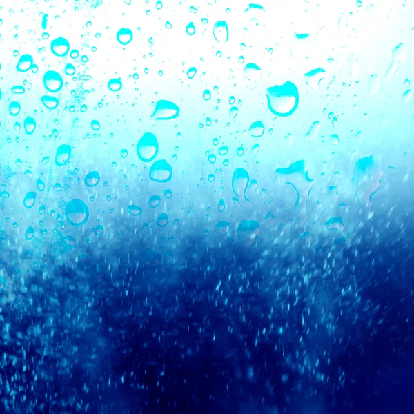 Oppervlak met druppels en damp, water in glas — Stockfoto