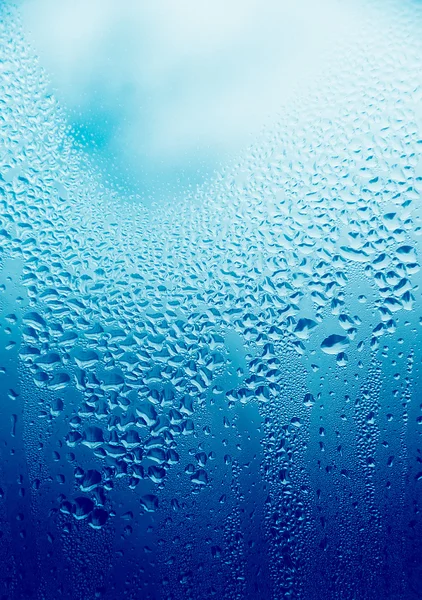 Fondo verticale con acqua su vetro — Foto Stock