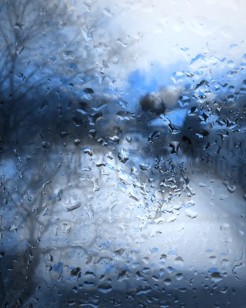 Wet after rain glass overlooking the street, wet glass — Stock Photo, Image