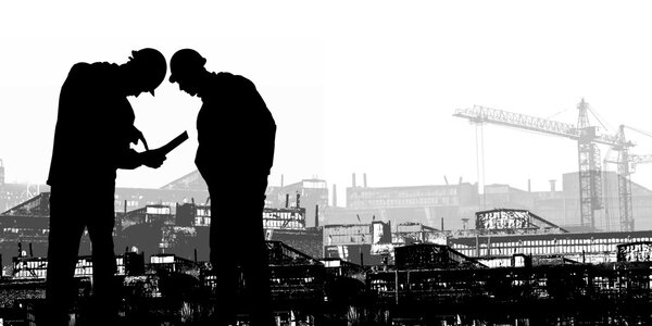 Silhouettes on a background of working factories