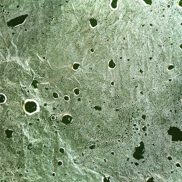 Brown water drops on a light background of wet — Stock Photo, Image