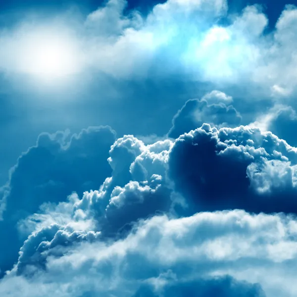 Cumulus clouds with sun — Stock Photo, Image